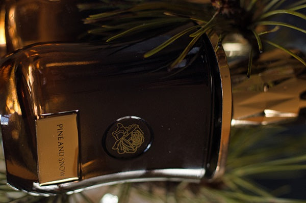 Lemon Verbena and crackling embers, Pine and Snow perfume cologne set