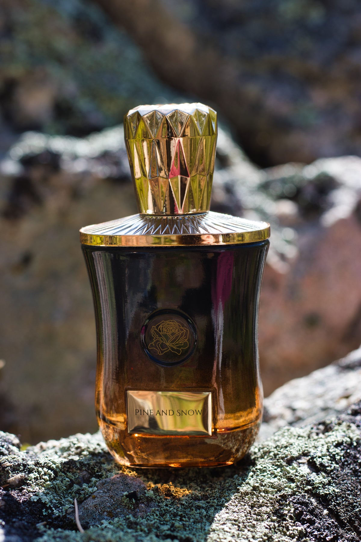 Fae Perfume Pine and Snow cologne bottle.